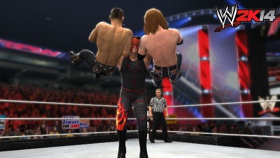 Una Double Choke Slam per il simpatico Red Devil. Mai far arrabbiare Kane, mai.